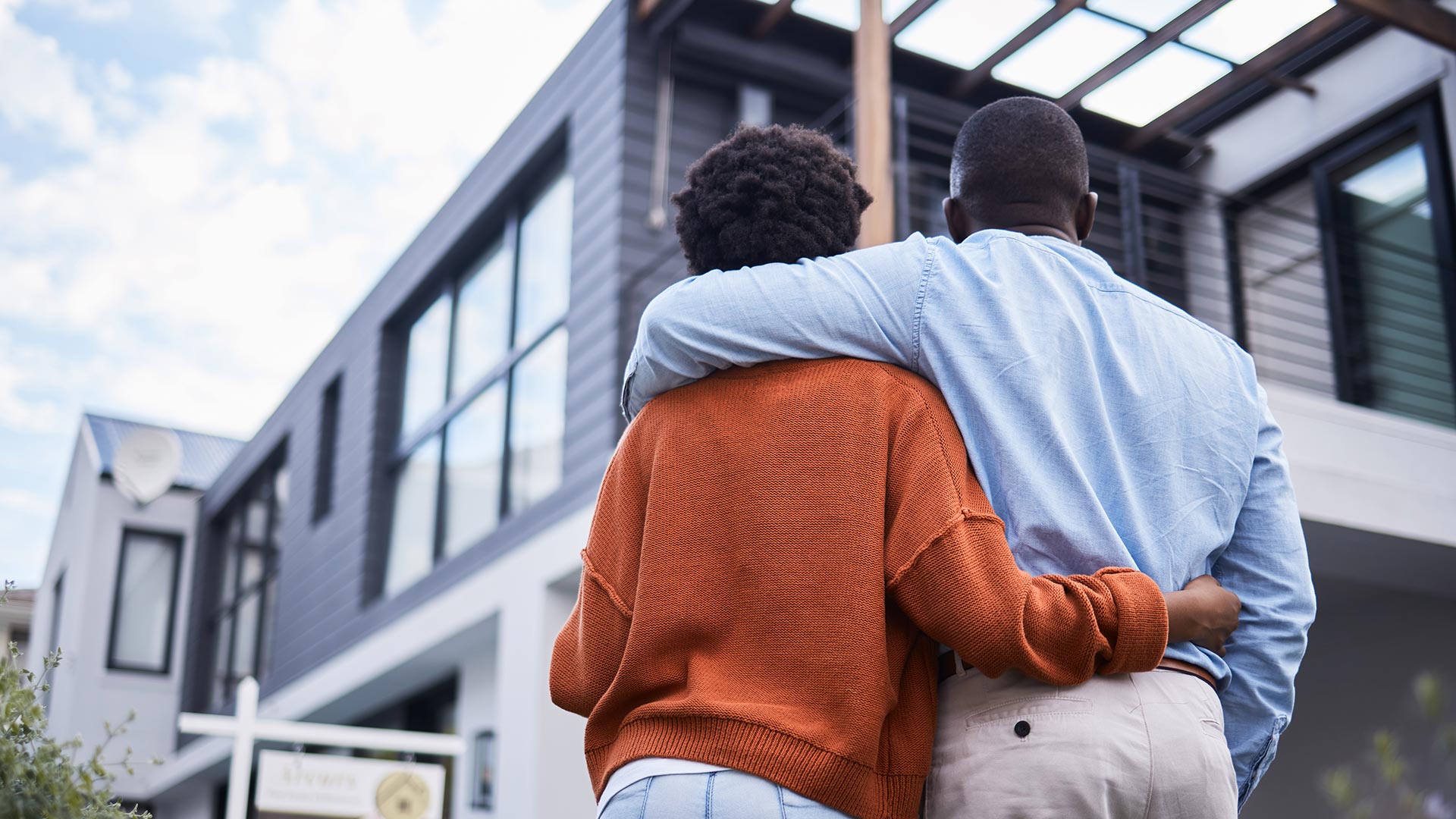 couple-embracing-while-looking-at-new-home-2026-03-25-08-25-23-utc
